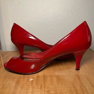Red peep toe pumps